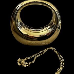 Gold Sculptural Acrylic Bag with Removable Chain Strap and Magnetic Closure